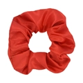 Detailed view of a red satin oversized scrunchie showing glossy fabric texture and pleats - Red