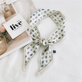 Silk scarf with white base and green pink leaf print tied in an elegant knot - 6x100cm / Herbal Leaf