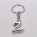 Minimalist silver polished metal keychain with letter Z pendant on a white background - Letter Z / Silver