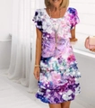 Detail of tiered skirt on a short sleeve chiffon dress with purple floral print - Starry Purple / S
