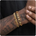 Close-up of gold Cuban and Figaro style stainless steel chains on a tattooed wrist - Style 3 / 18cm