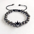 Detail of adjustable black beaded crown bracelet with professional braided drawstring design - Round Beads Braided Crown Black