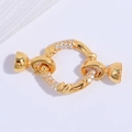Macro shot of gold-plated S925 silver pearl necklace clasp with pavé cubic zirconia - Gold Bamboo Knot Clover Buckle