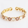 Gold open bracelet with white enamel hearts and purple zircon flower details - Heart White
