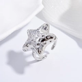 Anello vintage a stella marina in argento con trama martellata e design aperto regolabile - Stella Martellata Argento