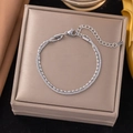 Double-layered sparkling silver titanium steel bracelet with star beads and lobster clasp - Rice Bead Starry Silver