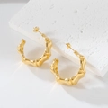 French vintage style bamboo hoop earrings in golden finish on a stone platform - 18K Purity / Gold