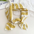 Cotton linen square scarf with yellow leaf print tied in a bow as a headband or neck scarf - Leaf Vein Yellow