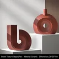 Brown textured ceramic vase set with minimalist circular and U-shaped geometric designs - Terracotta Vase Pair 2181