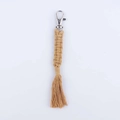 Handmade woven silver keychain featuring a beige cotton rope with fringe and swivel clasp - Earthy Yellow