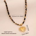 Leopard print rope necklace with golden heart sun pendant and size specifications - Heart Sun