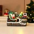 Lighted Christmas village resin music box with miniature Santa and snow-capped cabin - Santa Claus