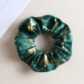 Dark green velvet scrunchie with gold Christmas patterns of snowflakes and reindeer - Green Velvet Gold Stamping
