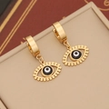 Detailed view of gold evil eye hoop earrings on a beige leather jewelry box - Round Wavy Eye (6#)