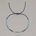 Handmade woven seed bead bracelet in blue tones with adjustable sliding cord closure - Dark Blue Rope Blue White Gold Seed Beads (MI-B230001B)