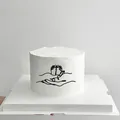 Detail of minimalist black line art on cake showing hands holding baby feet decoration - Hands Holding Feet Style 2 / Black