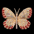 Dettaglio macro della farfalla dorata con cristalli rossi e iridescenti AB lucidi - Rosso