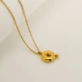 Golden Q letter bubble pendant necklace in stainless steel on a white background - Letter Q / Gold