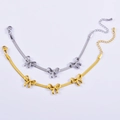 Bracciale a serpente piatto con tre pendenti a fiocco in oro e argento - Braccialetto Oro