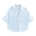 Detailed flat lay of blue striped linen shirt with chest pockets and wood buttons - XS / Sky Blue Stripe