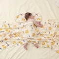 Soft bamboo cotton baby blanket and pillow set with cute duck print in beige - Lost Duck