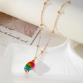 Gold beaded chain necklace with vibrant gradient rainbow shell pendant on white display - Colorful Shell-Style 1