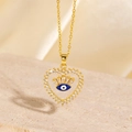 Macro view of gold heart necklace with blue evil eye inlay and sparkling crystals - Style F (Blue Evil Eye with Clear Zircon) / 14K Gold / Gold