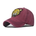 Detail of vintage burgundy baseball cap featuring leopard head embroidery and distressed brim - M (56-58cm) / Leopard Wine Red