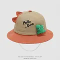 Detail of baby sun hat featuring Hello Dino embroidery and green plush dinosaur ornament - 50cm (1-3 Years) / Khaki