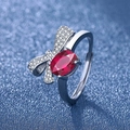 Adjustable silver ring with red oval stone and sparkling bow accents on blue - Bow [platinum Gold] Ljz-183 / Adjustable Open