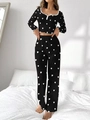 Detail of black pajama set with white heart print and ruffled lettuce trim edges - S / Black with White Heart