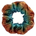 Dettaglio di elastico in tessuto laser con sfumatura arcobaleno e trama metallizzata - Blu Marrone
