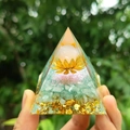 Orgone pyramid with white crystal ball, golden lotus, and green gravel resin finish - Style 20