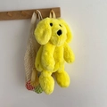 Cute yellow plush puppy backpack featuring soft fur texture and woven adjustable straps - Yellow