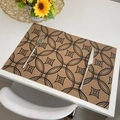 Brown rectangular placemat with black geometric pattern and linen texture and silver cutlery - Retro Style 3 Black
