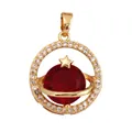 Planet pendant with red zircon center, gold plating, and star detail on white background - Red/Star Planet