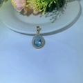 Pendentif goutte d'eau en zircon bleu clair avec finition dorée et détails - Pendentif Seul (Sans Chaîne) / Goutte d'eau Bleu Clair