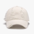 Distressed white cotton baseball cap with vintage washed finish and torn details - White