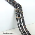 Deep grey and black natural Amazonite cylinder spacer beads on white steps - 2x4mm Spacer Beads (Approx. 150 Beads/Strand) / Black Amazonite