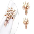 Rose gold napkin ring with floral bouquet design featuring pearls and rhinestones - Pearl Rhinestone Bow Bouquet