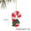 Mini canne en sucre en résine pour Noël avec rayures rouges blanches et nœud vert - Canne à Rayures Rouges et Blanches
