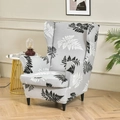 Elastic wingback chair cover featuring grey fabric with black and white fern leaf patterns - B&W Palm Leaves