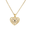 Goldene Herz-Halskette mit blauem Evil Eye-Anhänger und Pavé-Kristallen auf weißem Grund - Herz Böser Blick