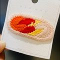 Handmade crochet oval BB hair clip in vibrant orange and pink tones on display card - 12# Orange Oval Slice