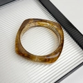 Detailed view of amber resin bangle with square thick design and marble texture - Style C Amber Square