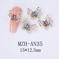 Macro detail of 3D aurora butterfly nail charms with gold alloy frame for luxury nail art - Aurora White Gold Style (AN35)