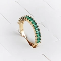 Detailed view of adjustable gold ring with square green cubic zirconia stones - Adjustable Open / Green