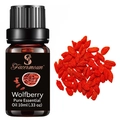 Wolfberry pure essential oil 10ml bottle with dried goji berries on white background - Goji Berry Oil