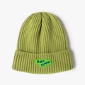 Grass green knitted beanie with jacquard letter patch for casual autumn warmth - Grass Green