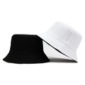 Classic black and white solid color cotton bucket hats shown in a minimalist composition - One Size(58cm) / Black-White